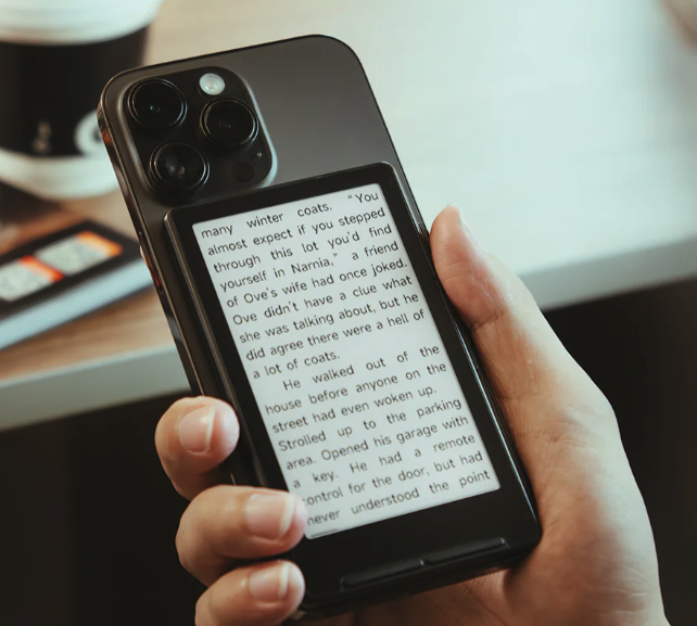 XTEink X4 on back of phone